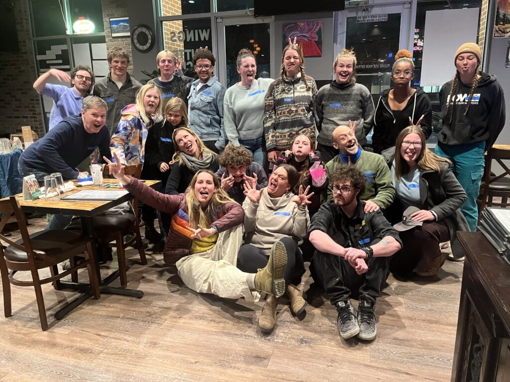 people in a restaurant posing for photo