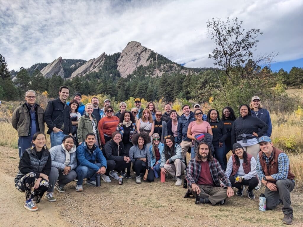 group posing in front of flatirons