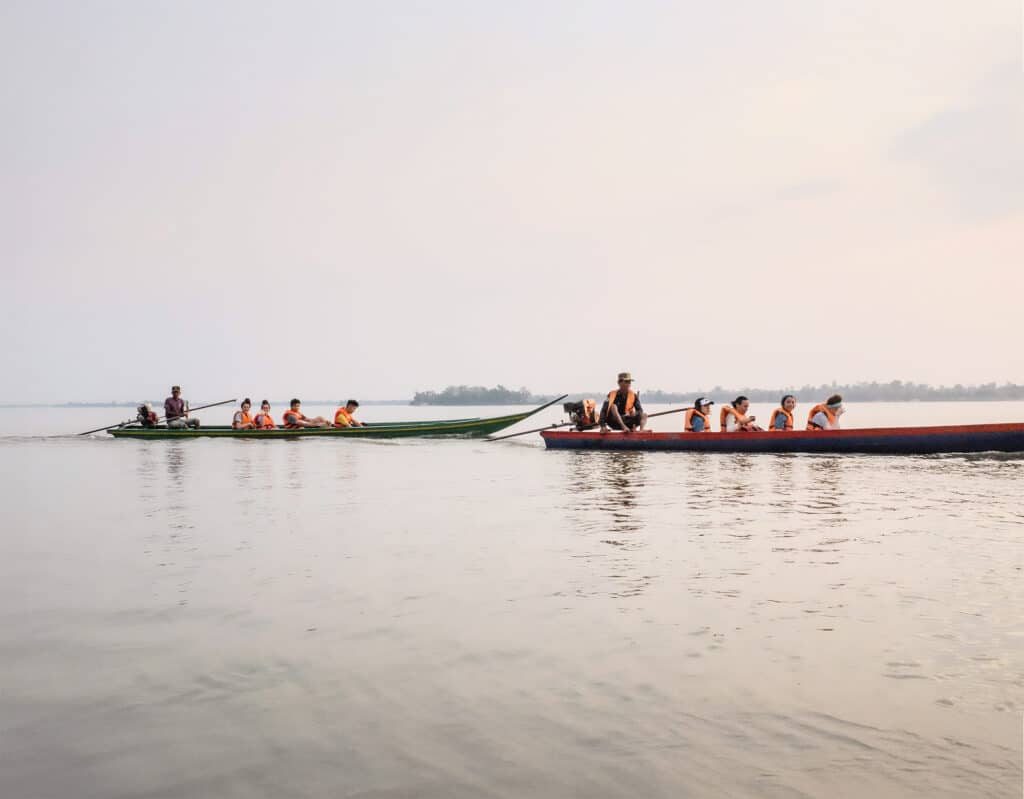 people on boats