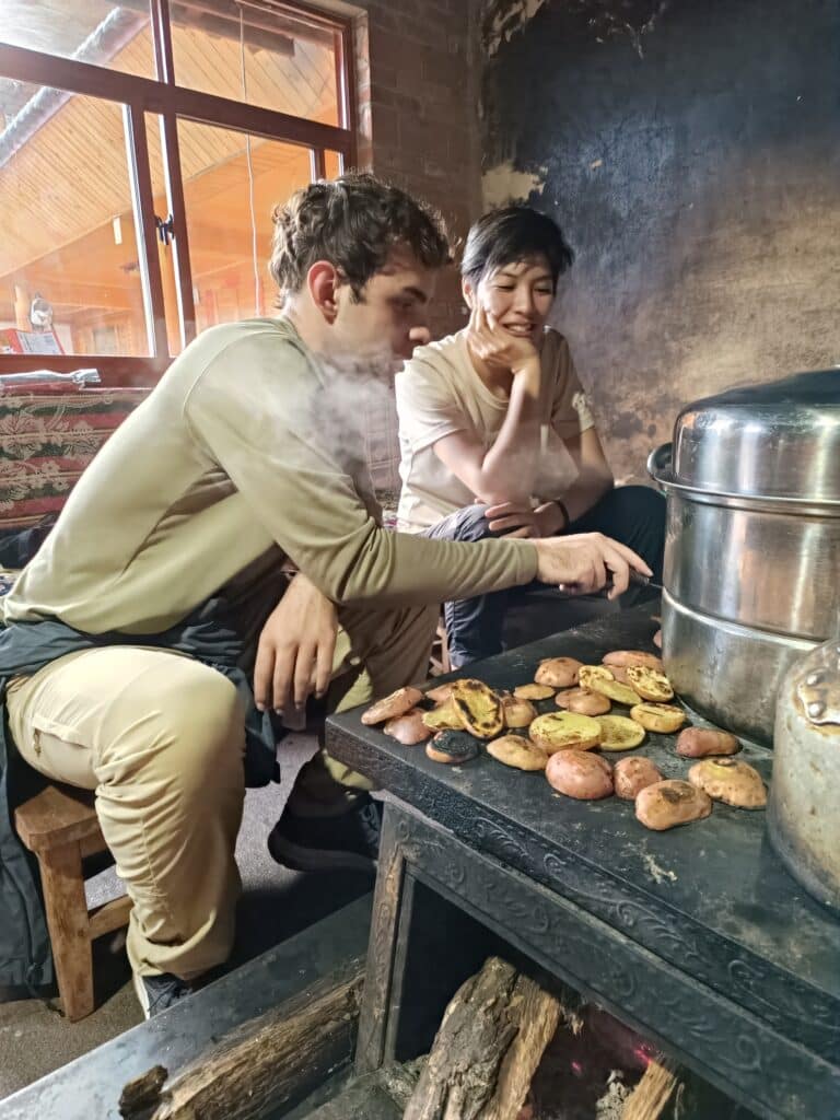 people seated and grilling food