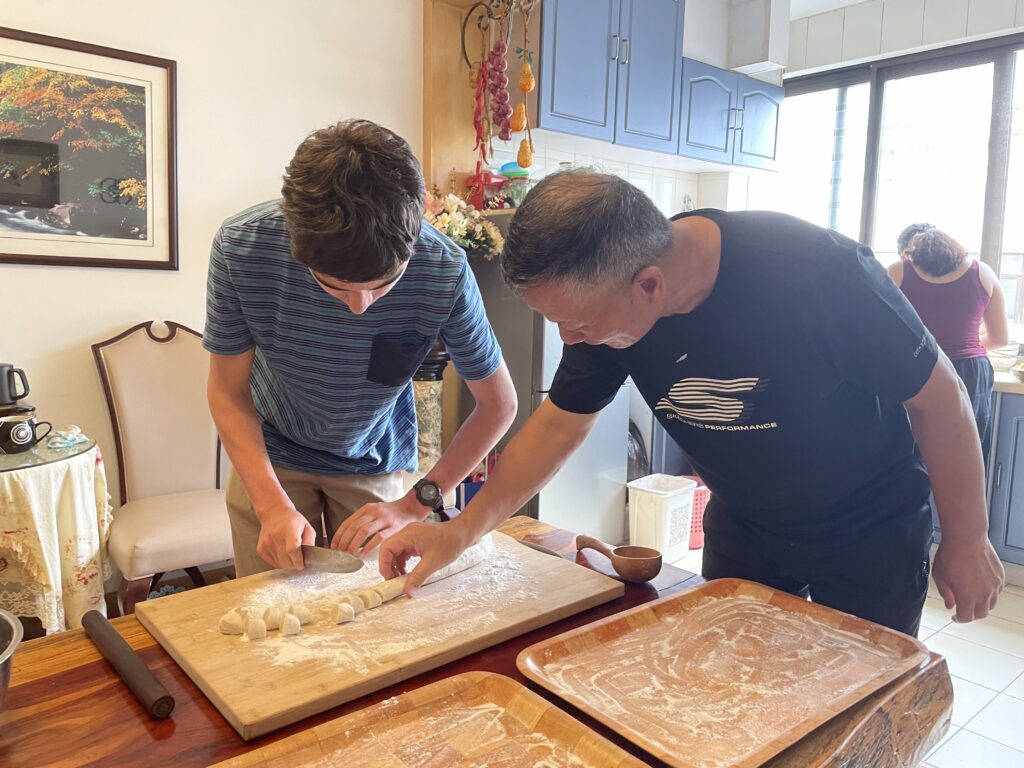 boy learning to cook