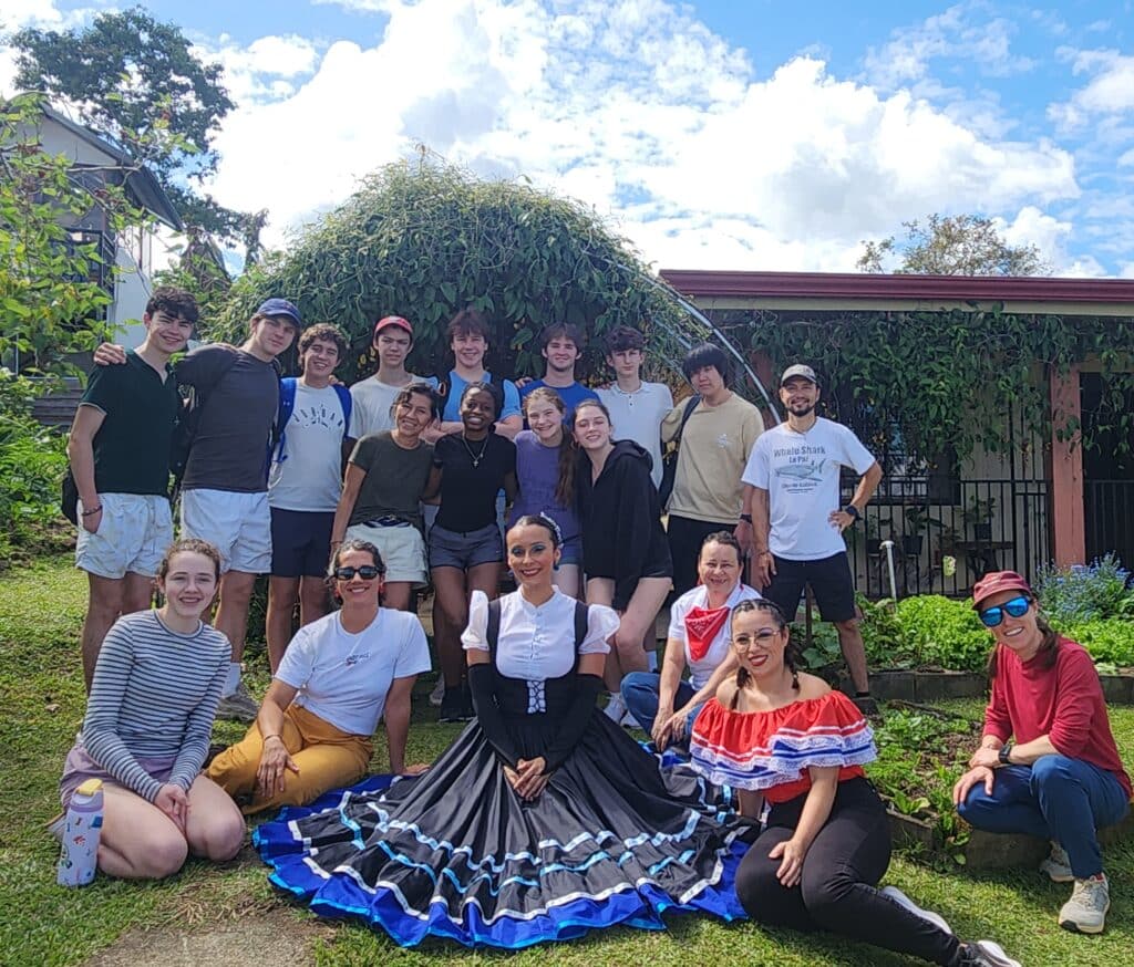 group posing with dancer
